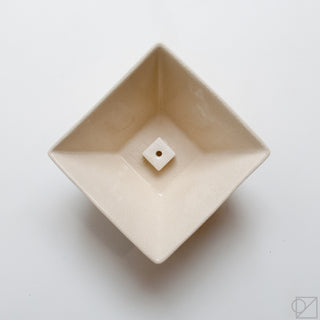 Off-white square ceramic incense burner bowl with incense stick holder on top