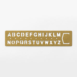 Brass alphabet and digit bookmark template with cutout A–Z letters and 0–9 numbers