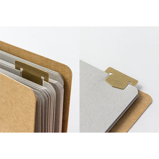 Brass bookmark number template set with metal plate and stacked backing papers
