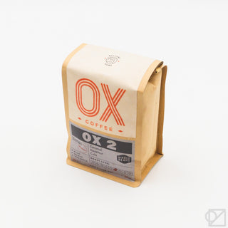 Whole bean coffee blend bag, kraft brown and cream with OX 2 label