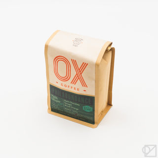 Whole bean coffee blend bag with OX logo, Philabundance green label