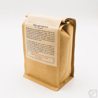Whole bean coffee blend bag with Philabundance details on back
