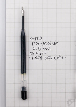 Black gel pen refill on graph paper, with 0.5 mm tip and cap at base