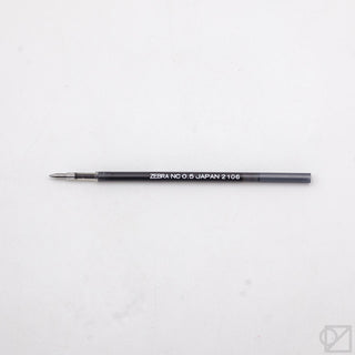 Black NC-0.5 ballpoint pen refill with 0.5mm tip, printed barrel text