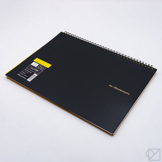 Black grid spiral notebook, gold logo text on cover with gold rings
