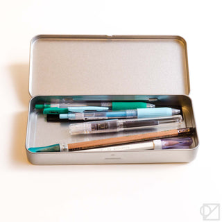 Stainless steel flat pen case open, showing pens and markers inside, silver finish