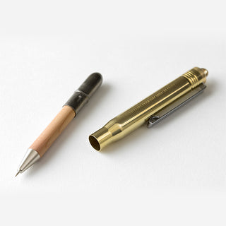 Brass ballpoint pen with wood-grain grip and black cap end