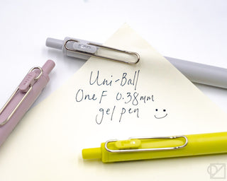 Uni-Ball One F 0.38mm gel pen, light gray barrel with metal clip and tip