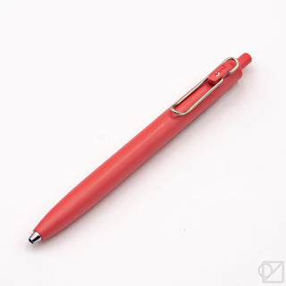 Red 0.5mm gel pen with metal clip and pointed tip